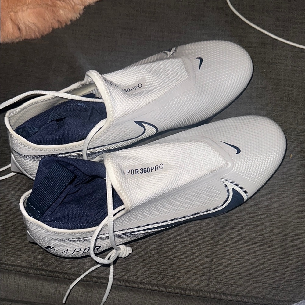 Nike White and Blue Cleats